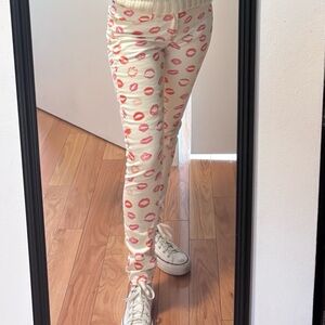 C. Wonder Cream Skinny Jeans with Pink Lips